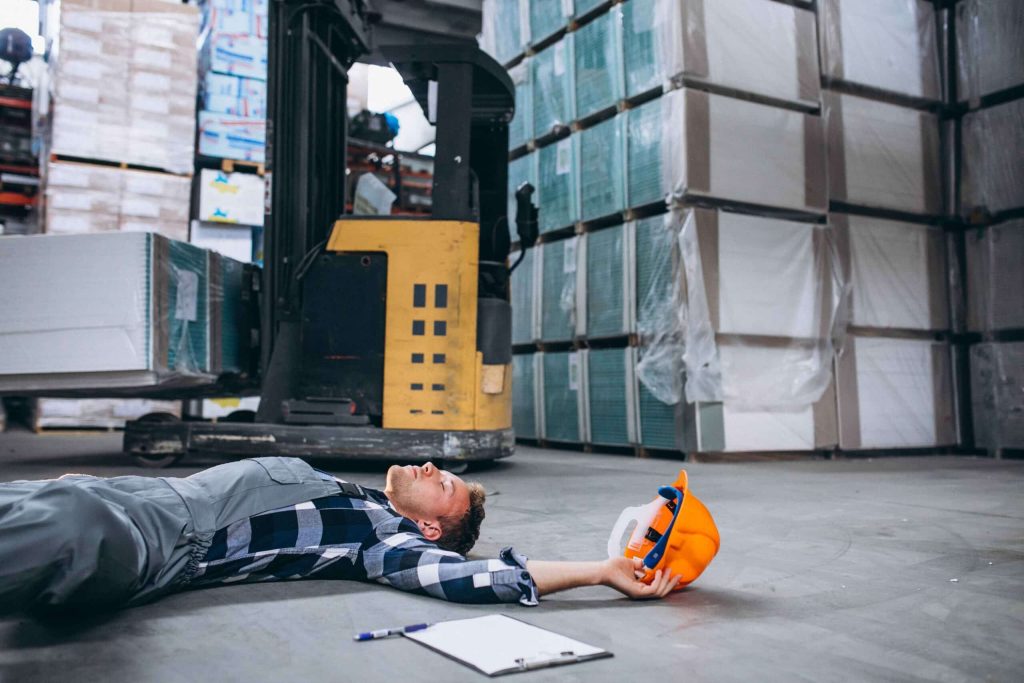 injured man in warehouse