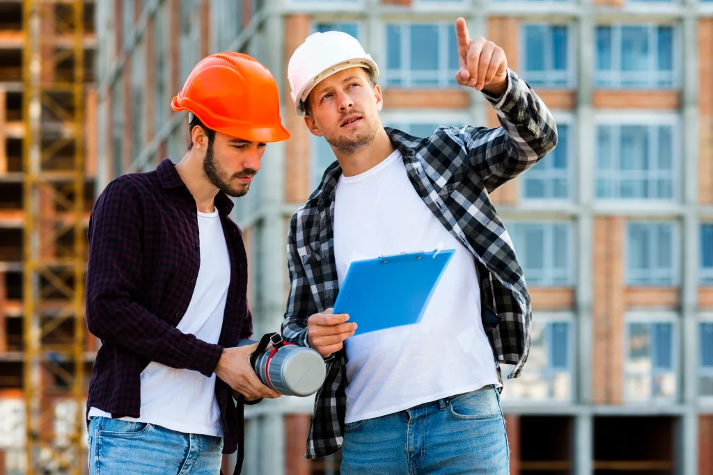 medium-shot-engineer-architect-looking-clipboard
